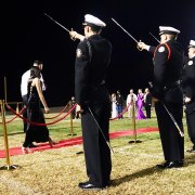 NJROTC form an honor line to greet Homecoming candidates.